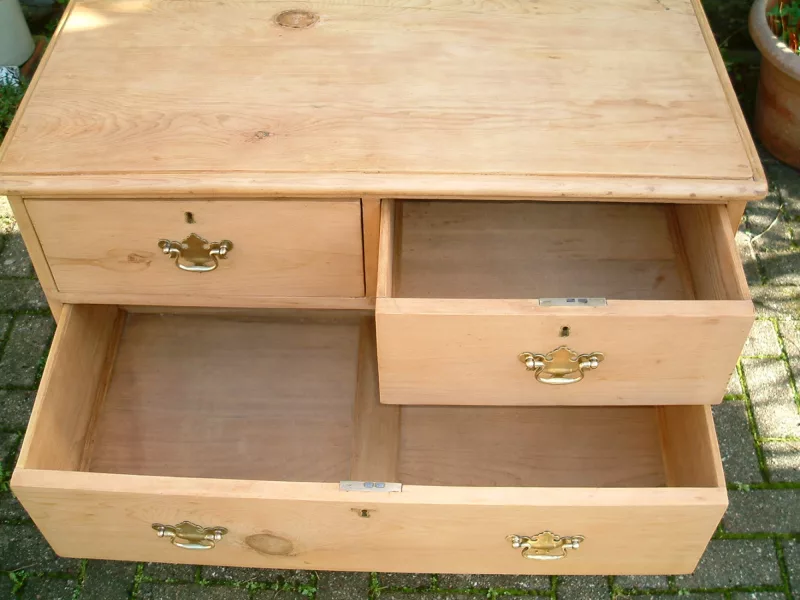 Image of top drawers open, showing timber drawer bases