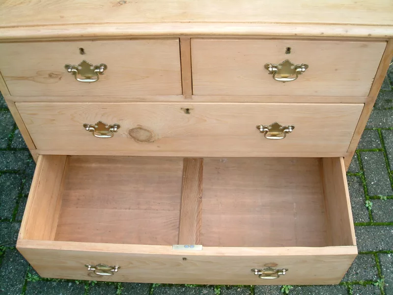 Image of internal of base drawer on antique pine chest