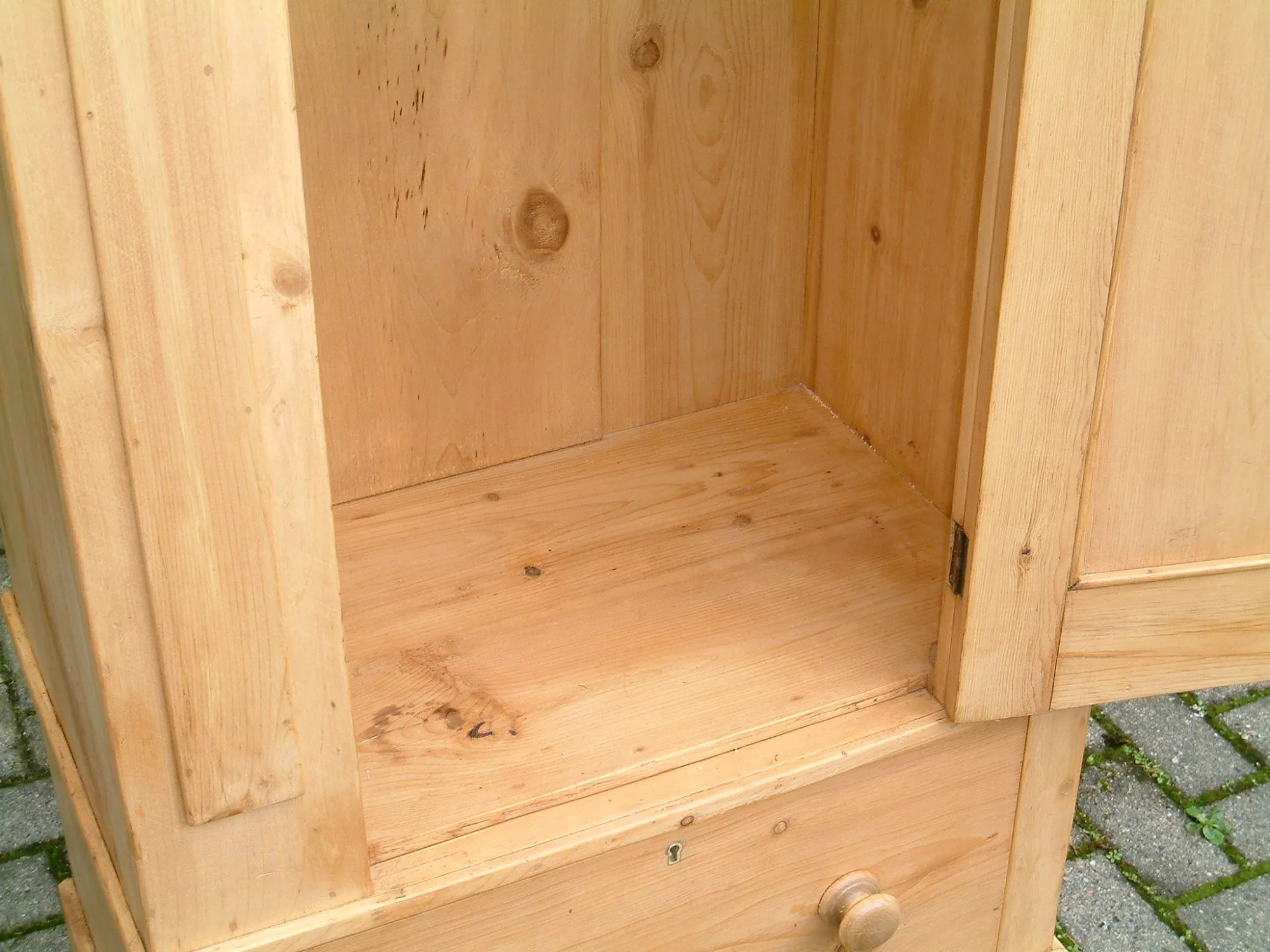 Image showing interior of base of antique pine wardobe