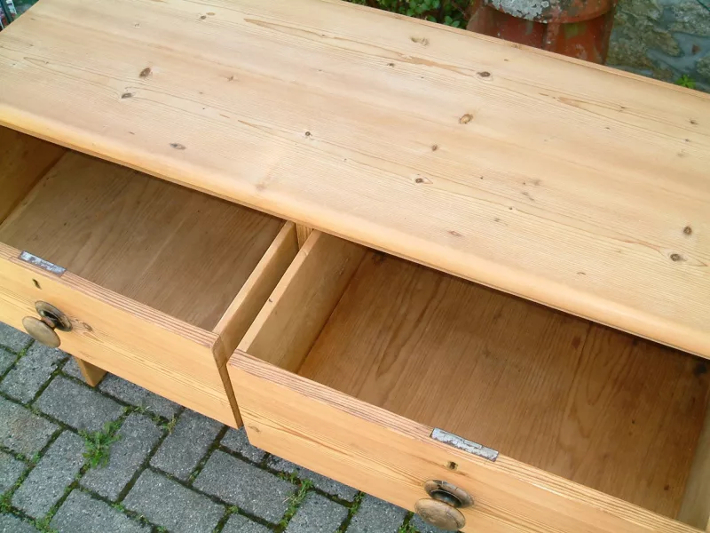 Image of the top drawers open on the vintage pine chest of drawers