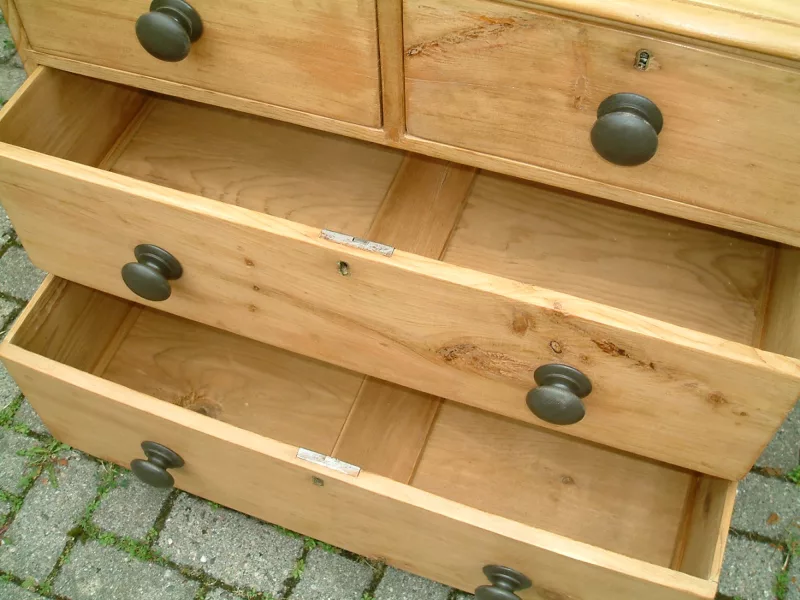 Image of the base drawers open on the Victorian pine chest of drawers
