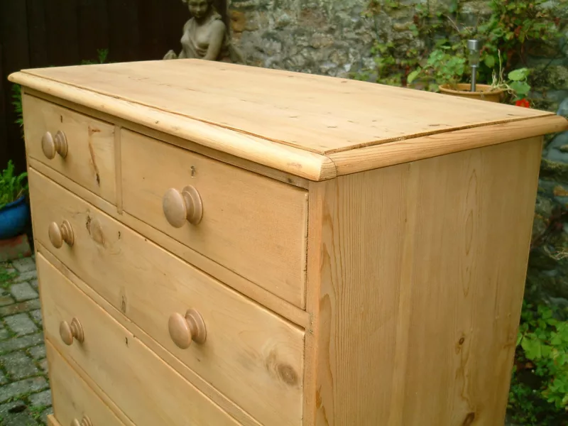 Image of the top mould on the Victorian pine chest of drawers.