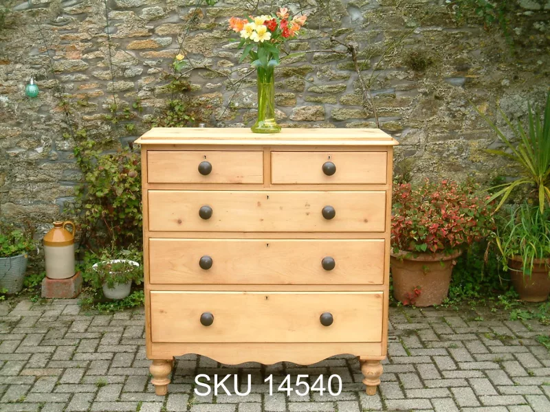 Front view of the Victorian pine chest of drawers with floral decoration