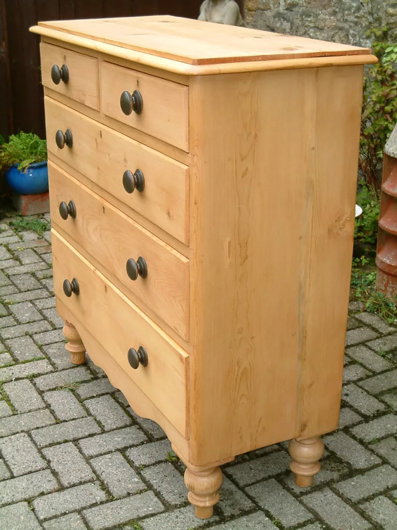 Image of the right side of the vintage pine chest