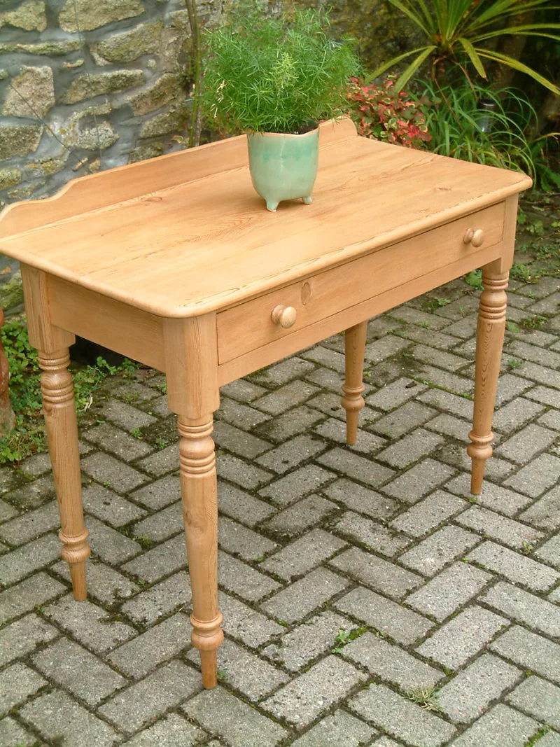 Image of the left side and front of the Victorian pine side table