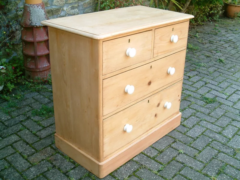 Image of the left side of the vintage pine chest