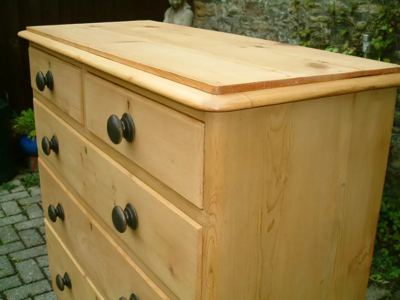 Image of the top bead, on the old pine chest