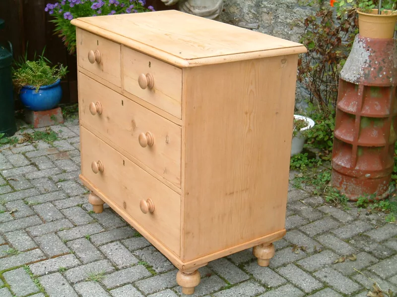 Image of the right of the old pine chest
