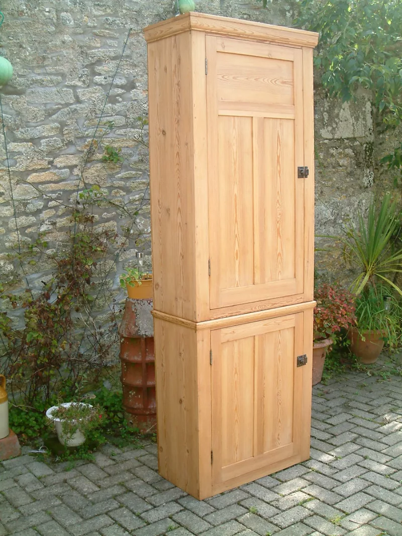 Image of the left side and front of the pine larder cupboard