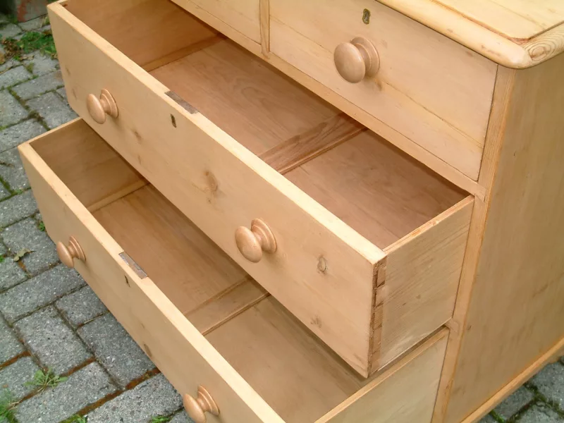 Image of the bottom and middle drawers open, showing quality of drawers on the antique pine chest