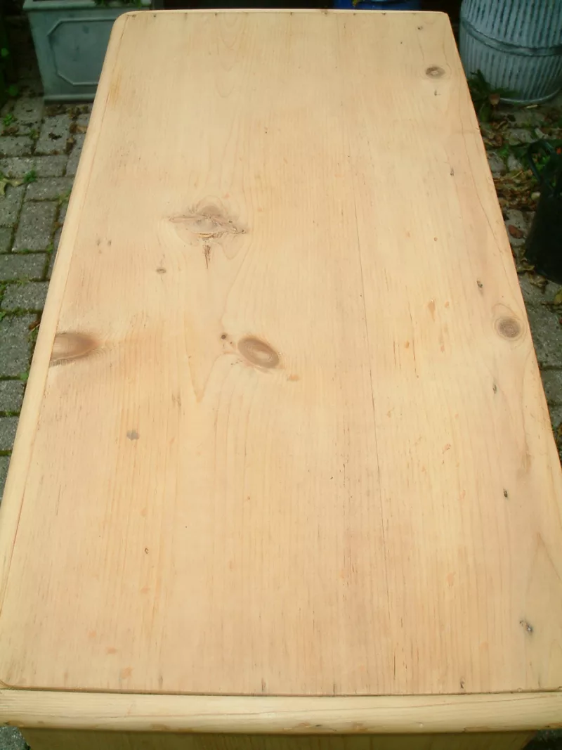 Image of the top of the stripped pine chest of drawers