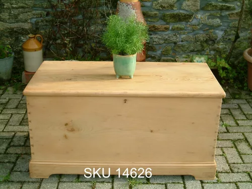 Front image of the Victorian pine blanket box with floral decoration