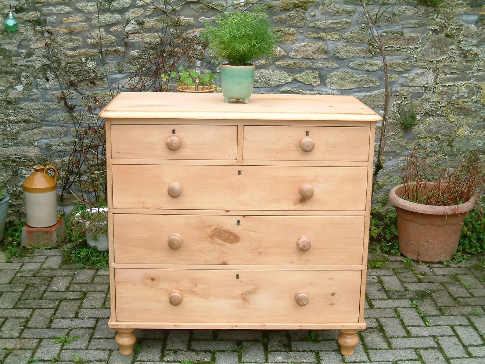 Front image of the Victorian pine chest, with floral decoration