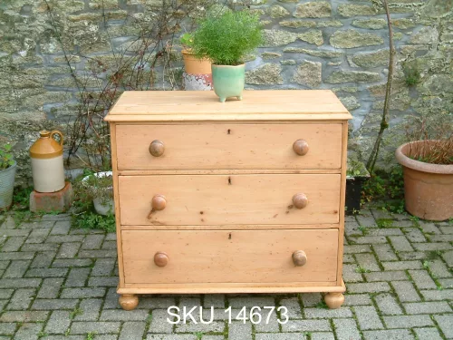 Front image of the Victorian pine 3 Drawer chest, with floral decoration