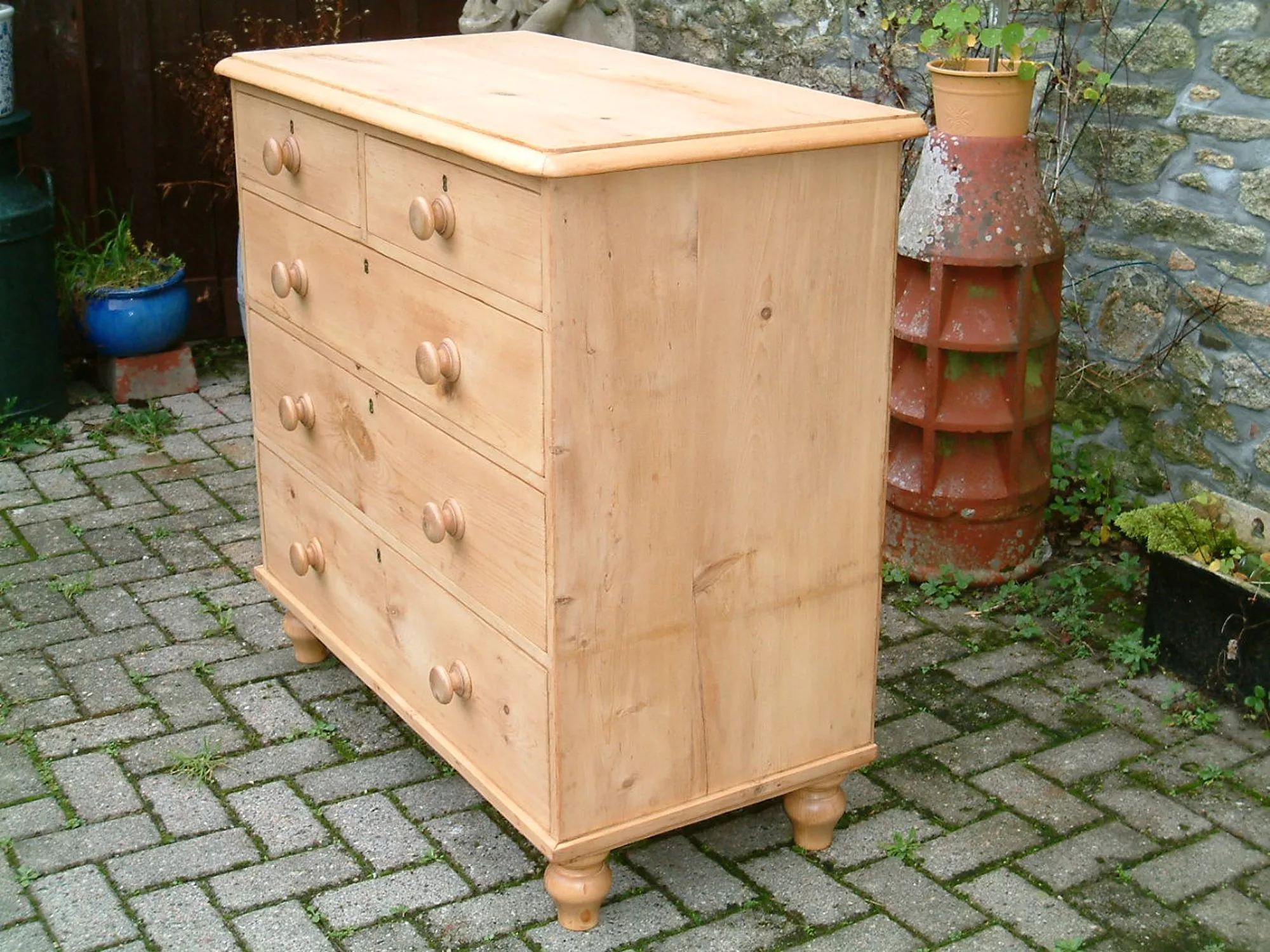 Image of the right side of the old pine chest of drawers