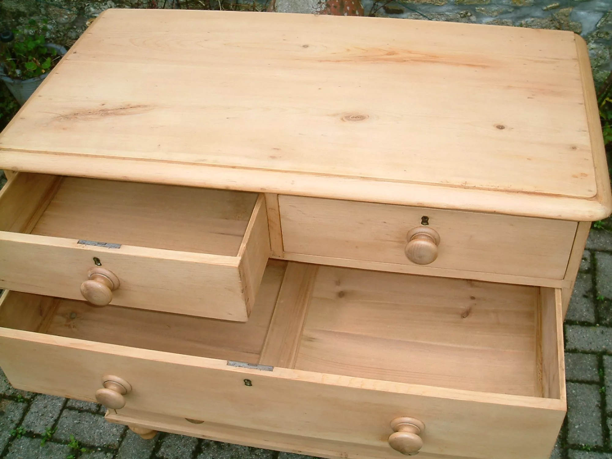 Image of the top drawers open showing the timber bases on the Victorian pine chest