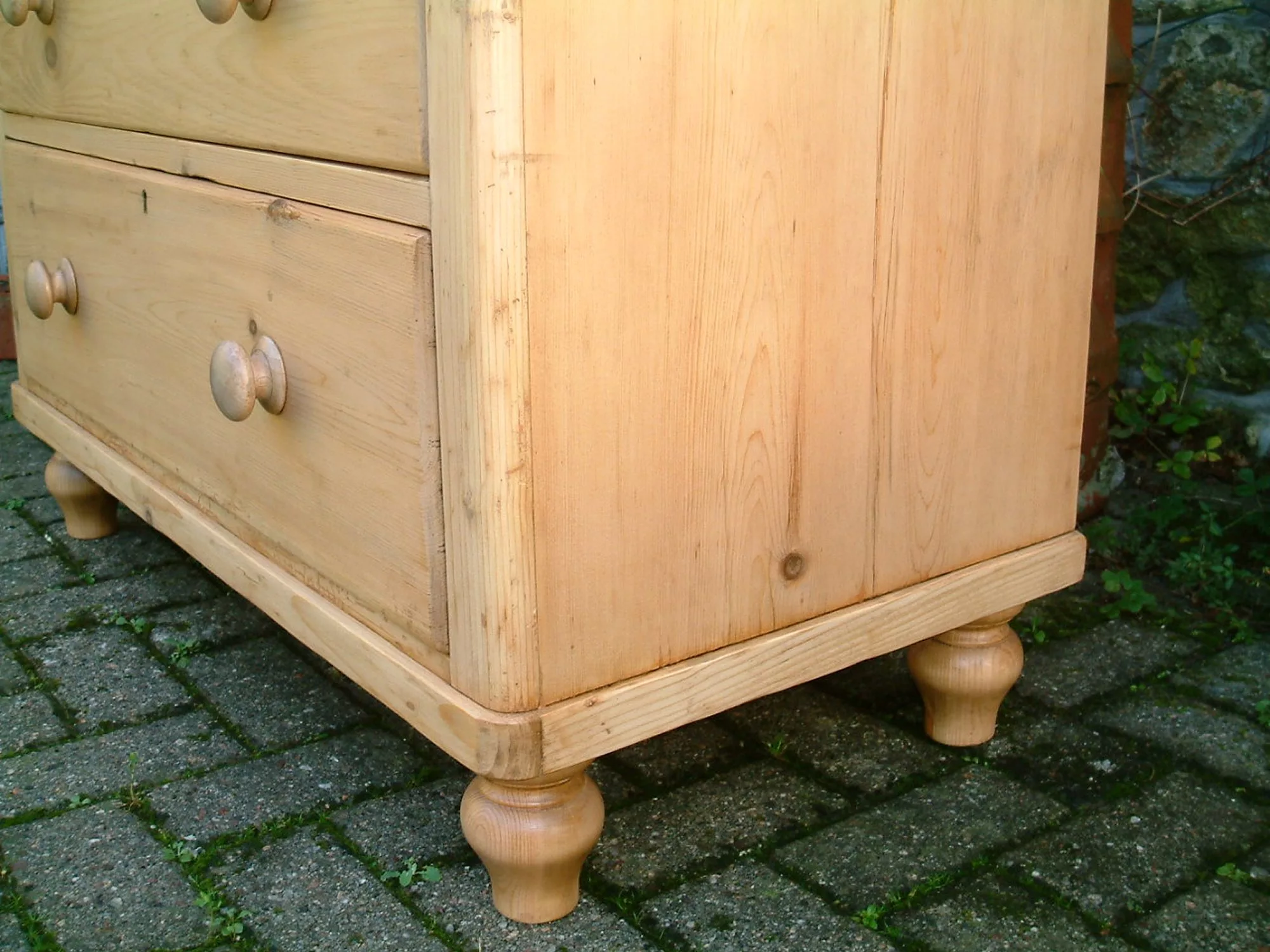 Image of the tulip feet fitted to the Victorian pine chest of drawers