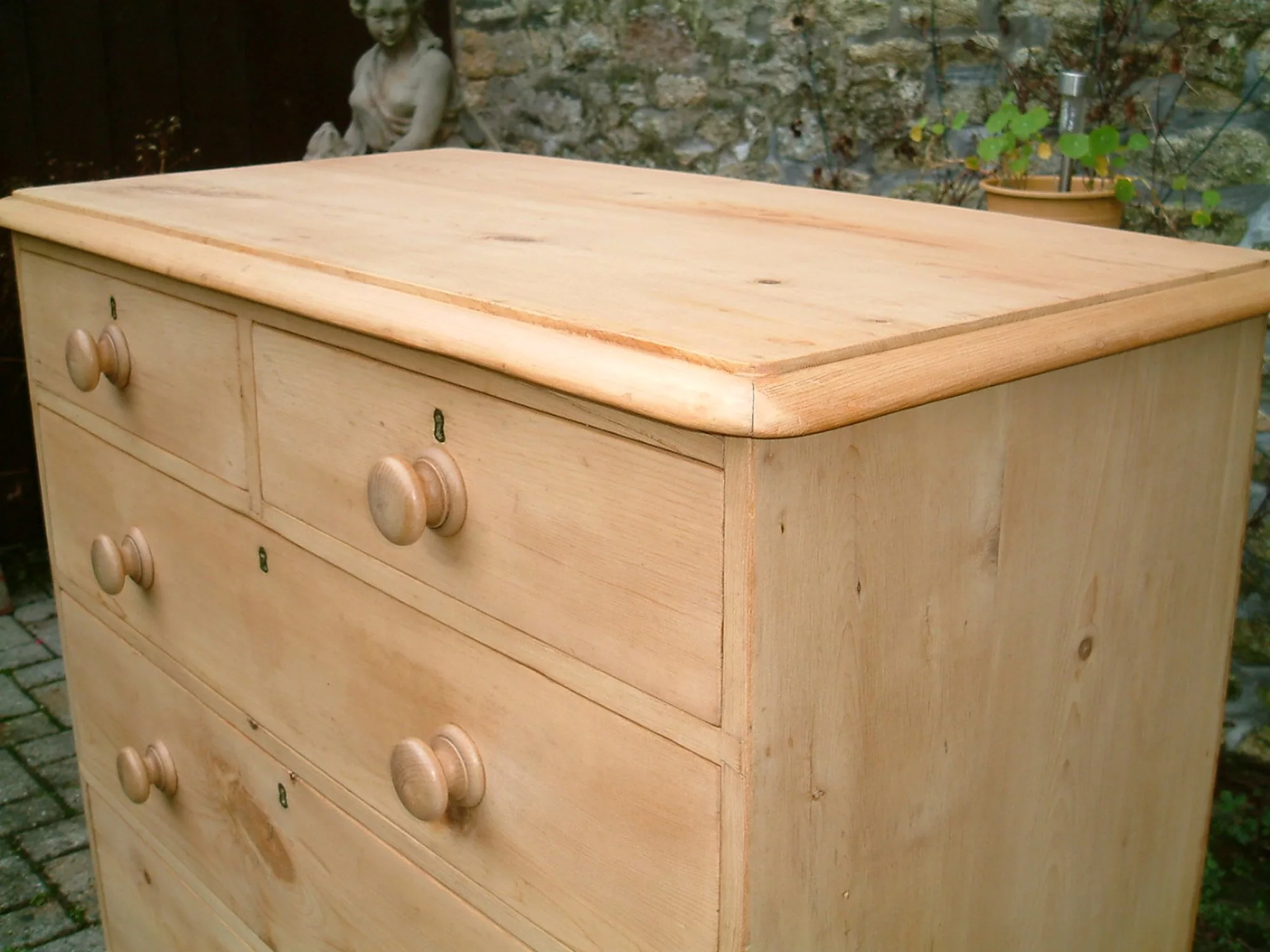 Image of the top bead on the antique pine chest of drawers