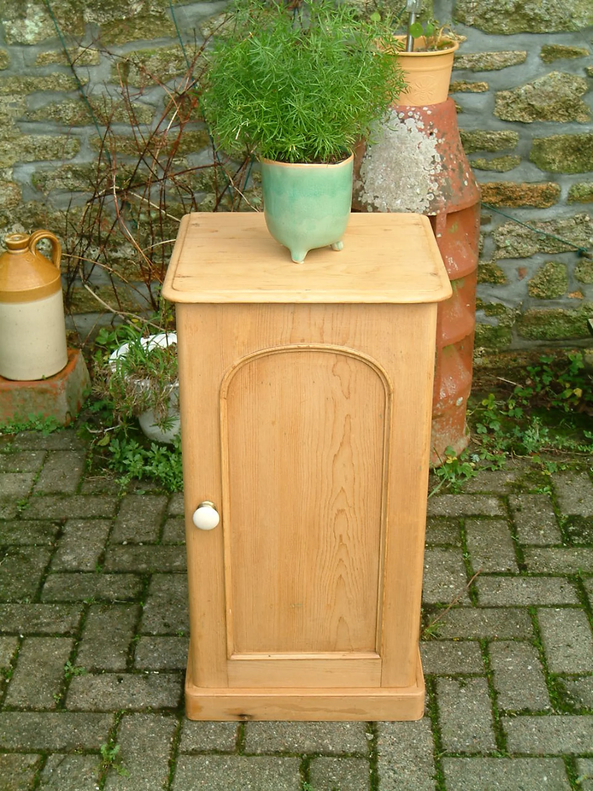 Front image of the Victorian bedside chest with floral decoration