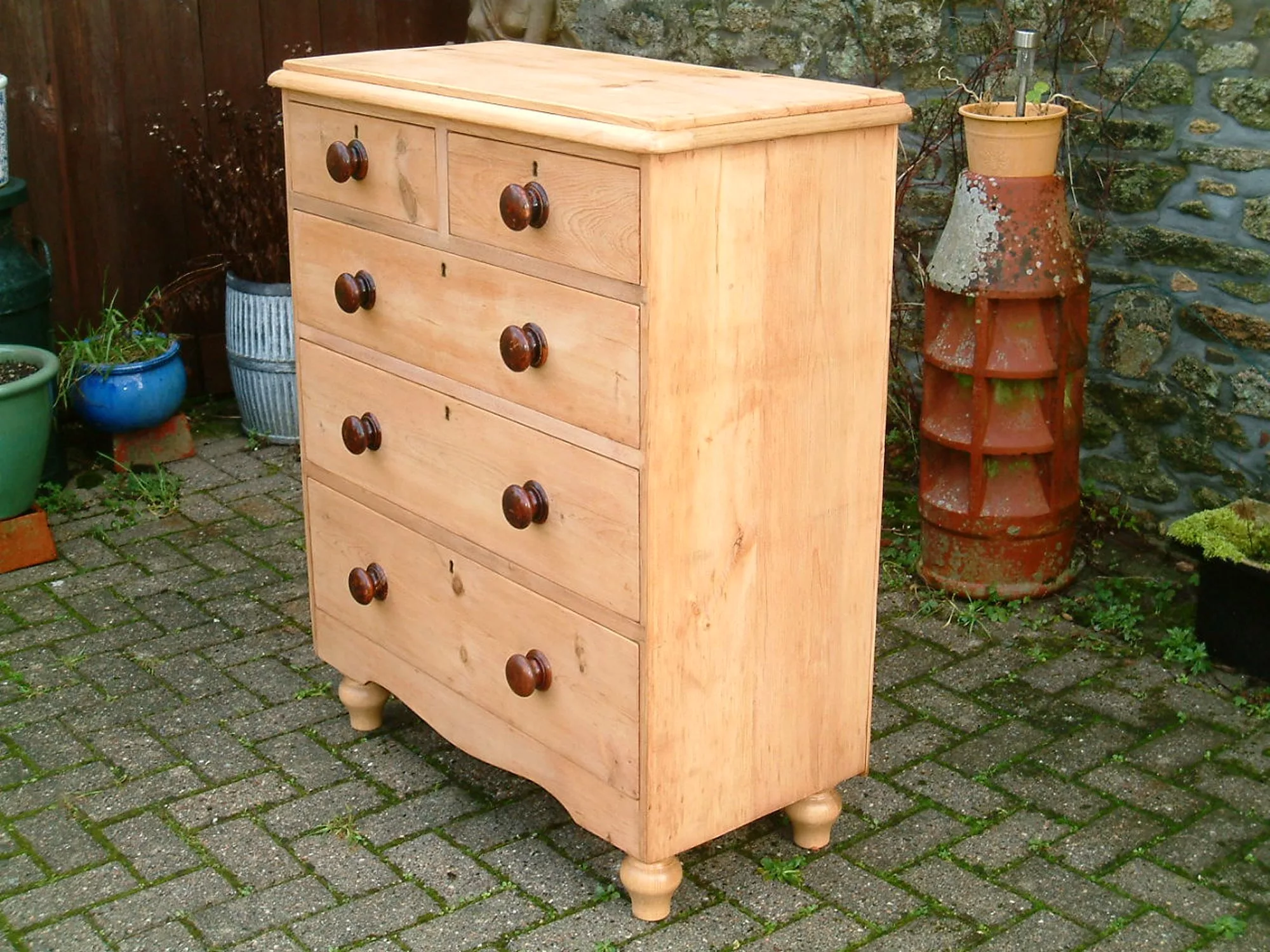 Image of the right side of the old pine chest of drawers