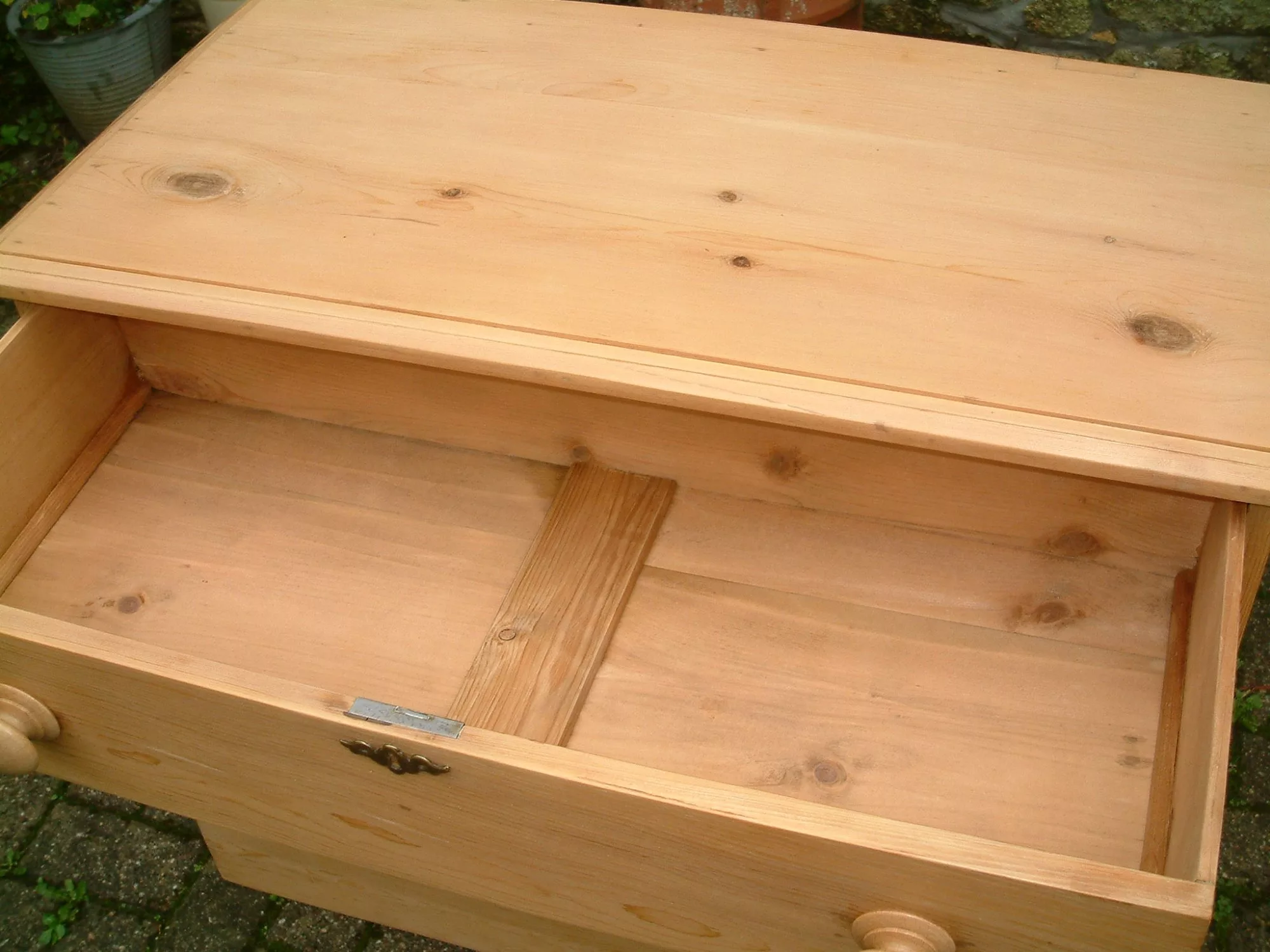 Image of the top and drawer ininterior of the old pine chest