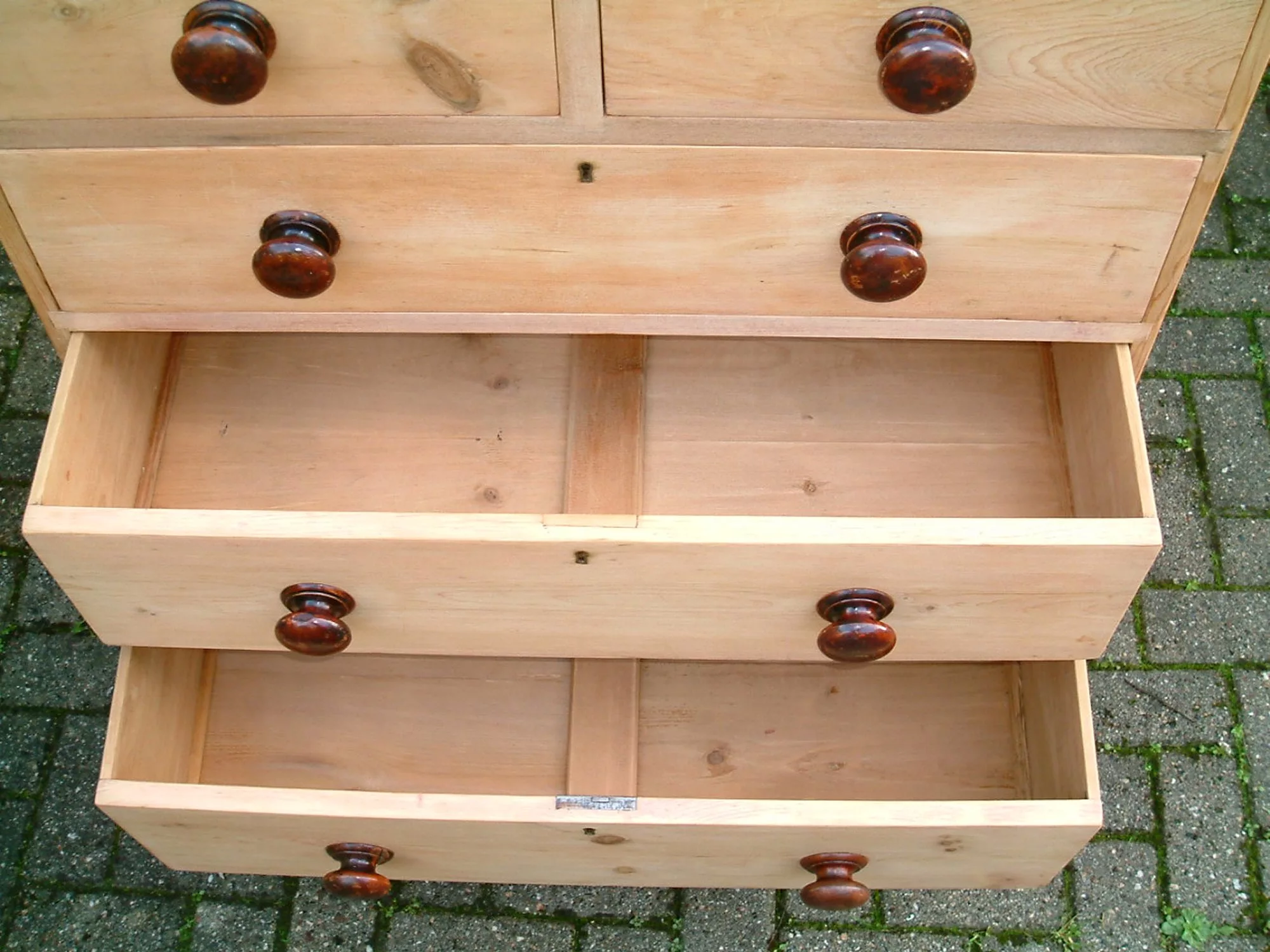 Image of the base drawers open on the antique pine chest of drawers