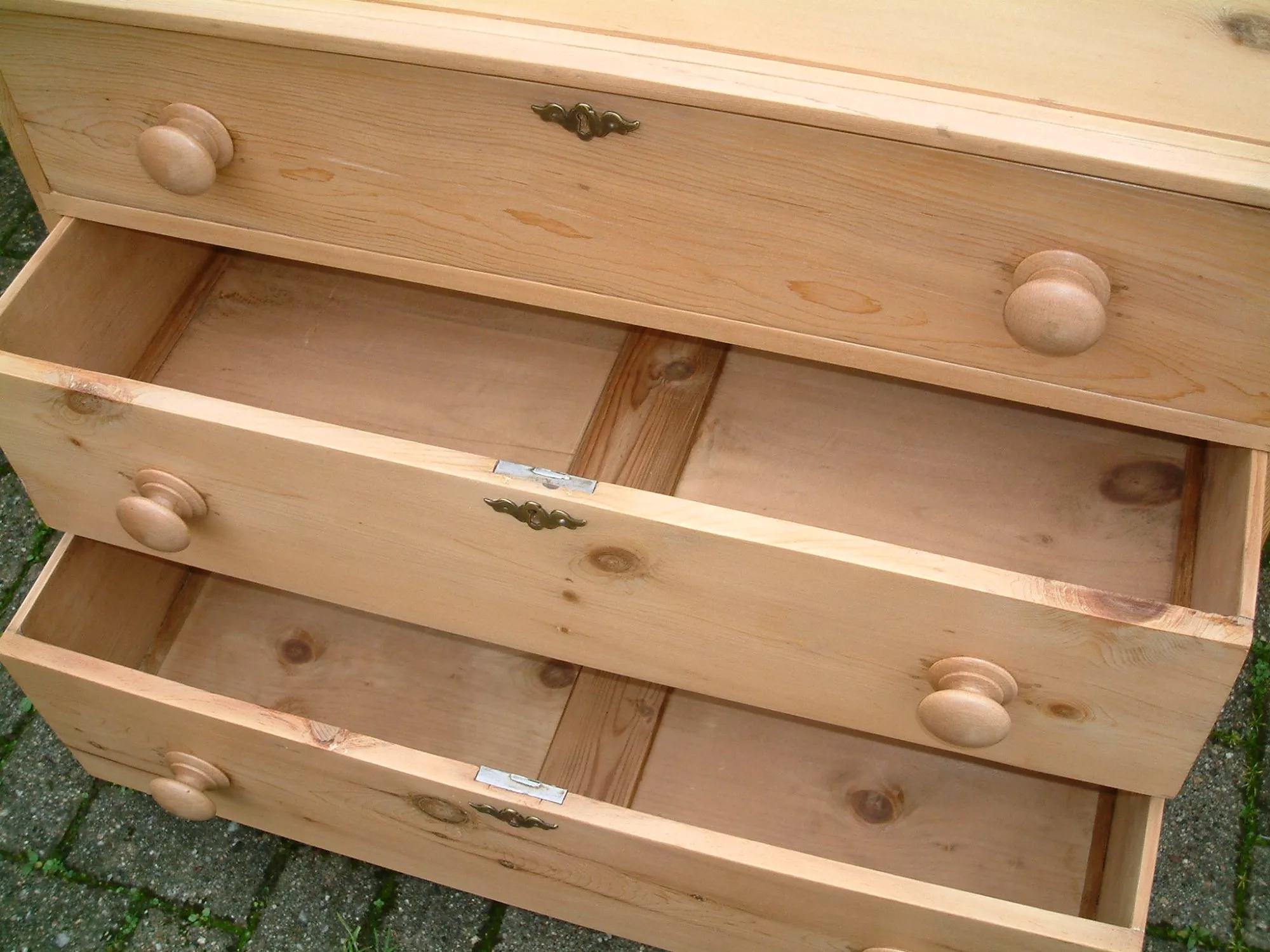 Image of the interior of the base drawers on the antique pine chest of drawers