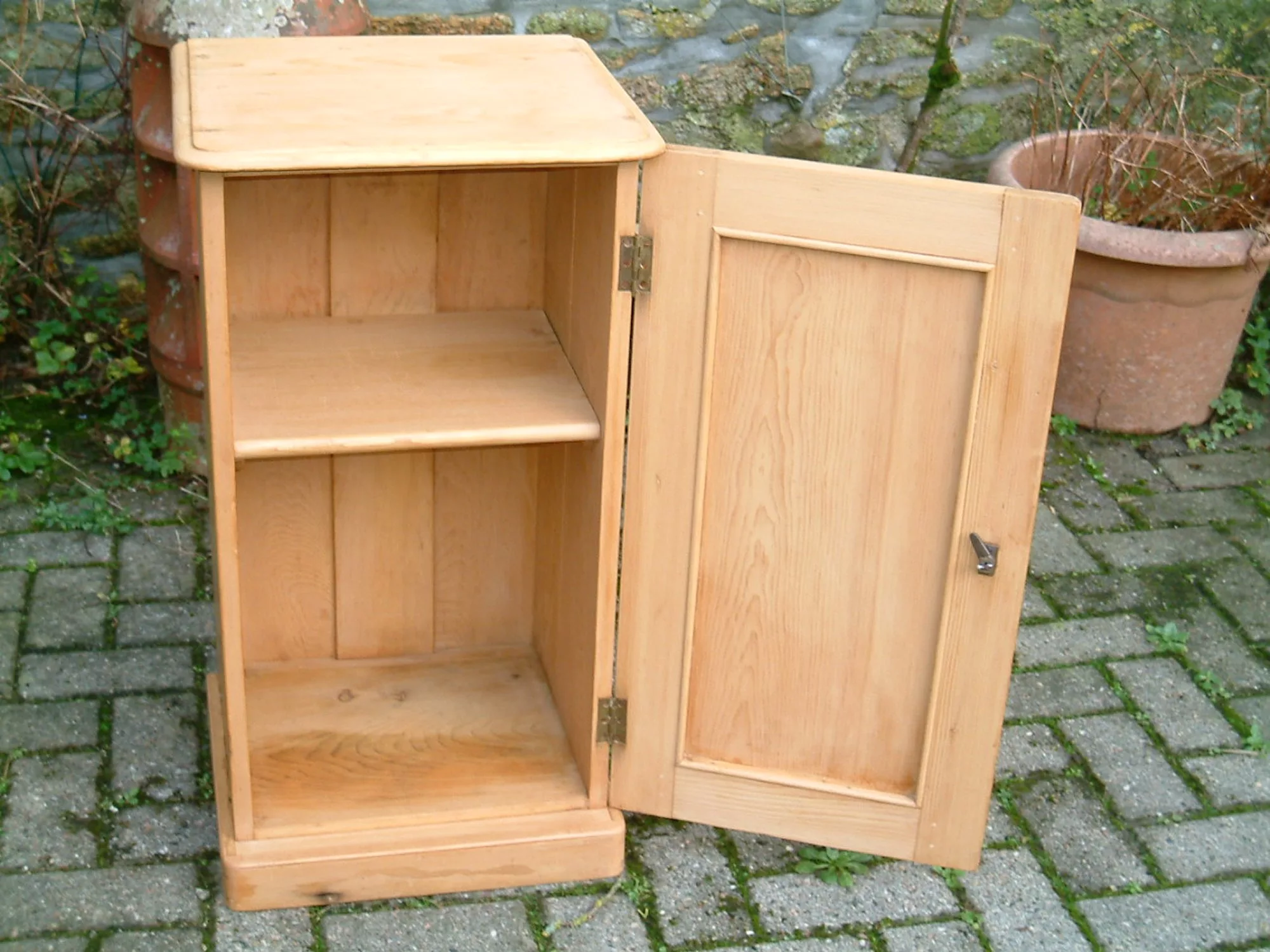 Image of the interior of the old pine bedside chest