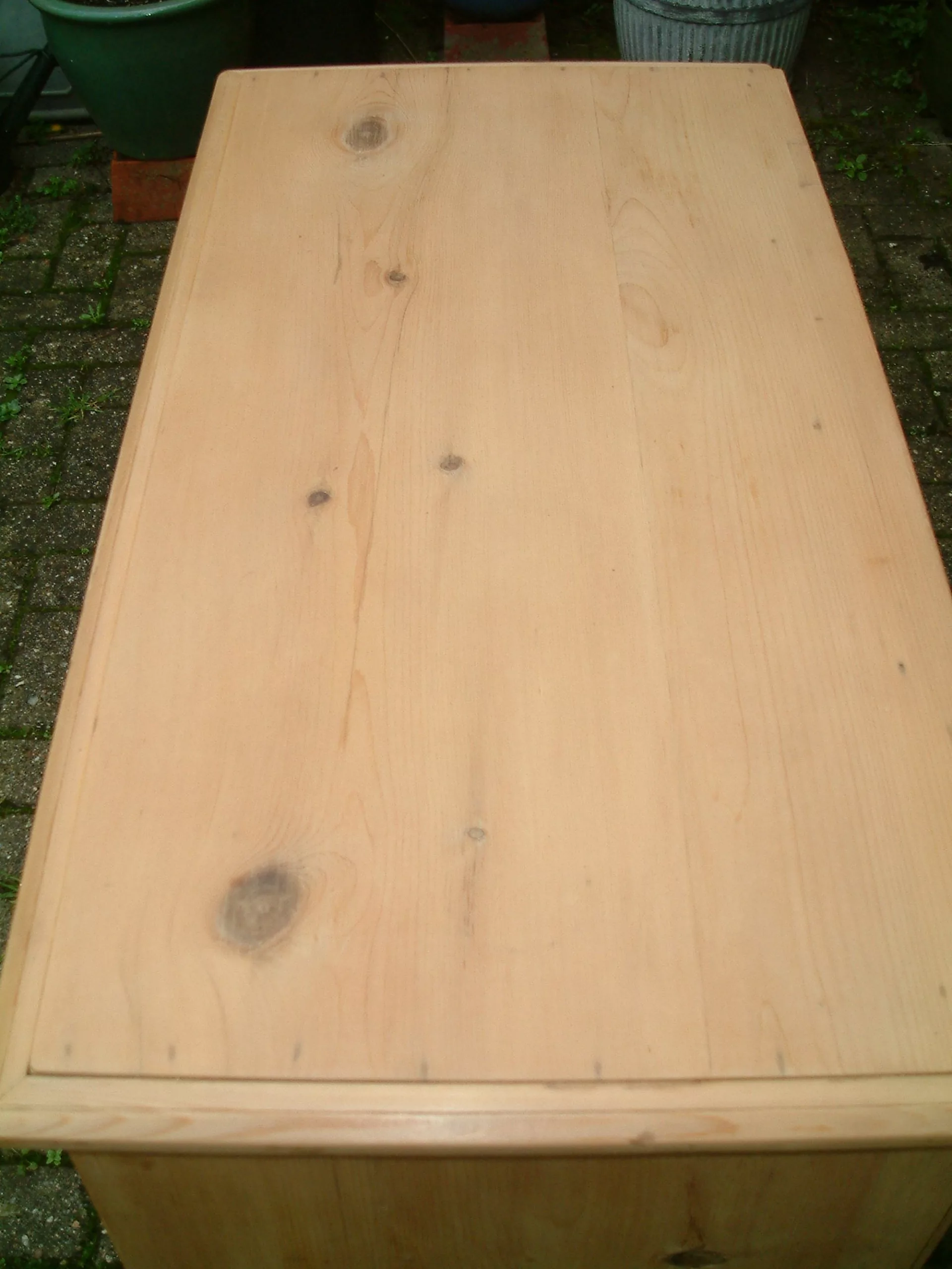 Image of the fine top on the old pine chest