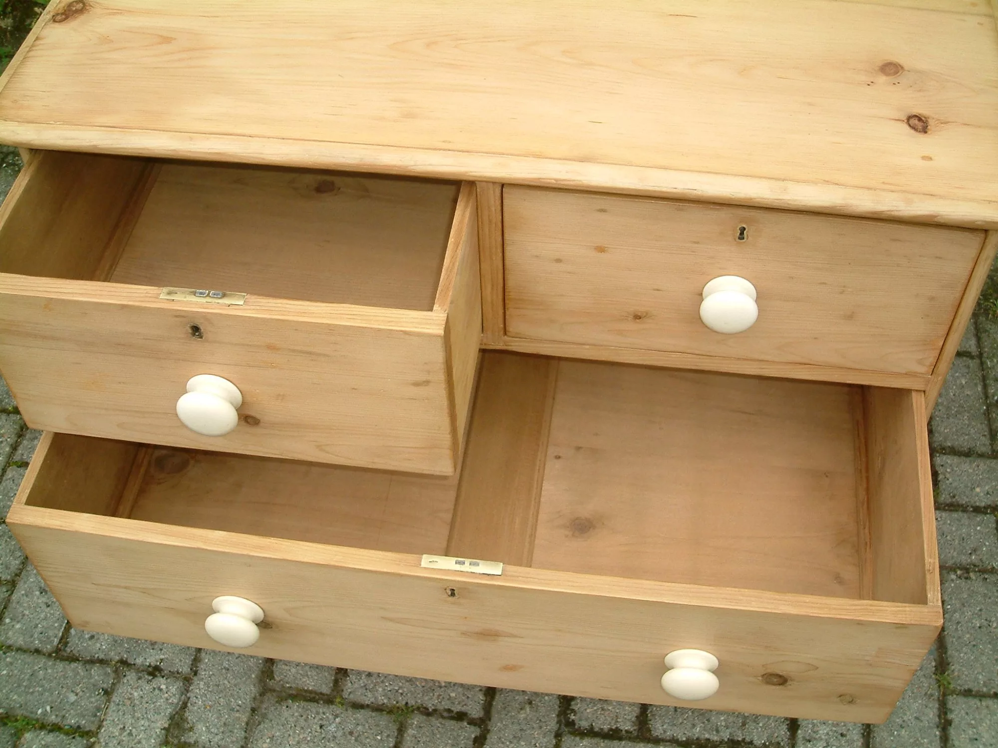 stripped pine chest of drawers - top drawers open