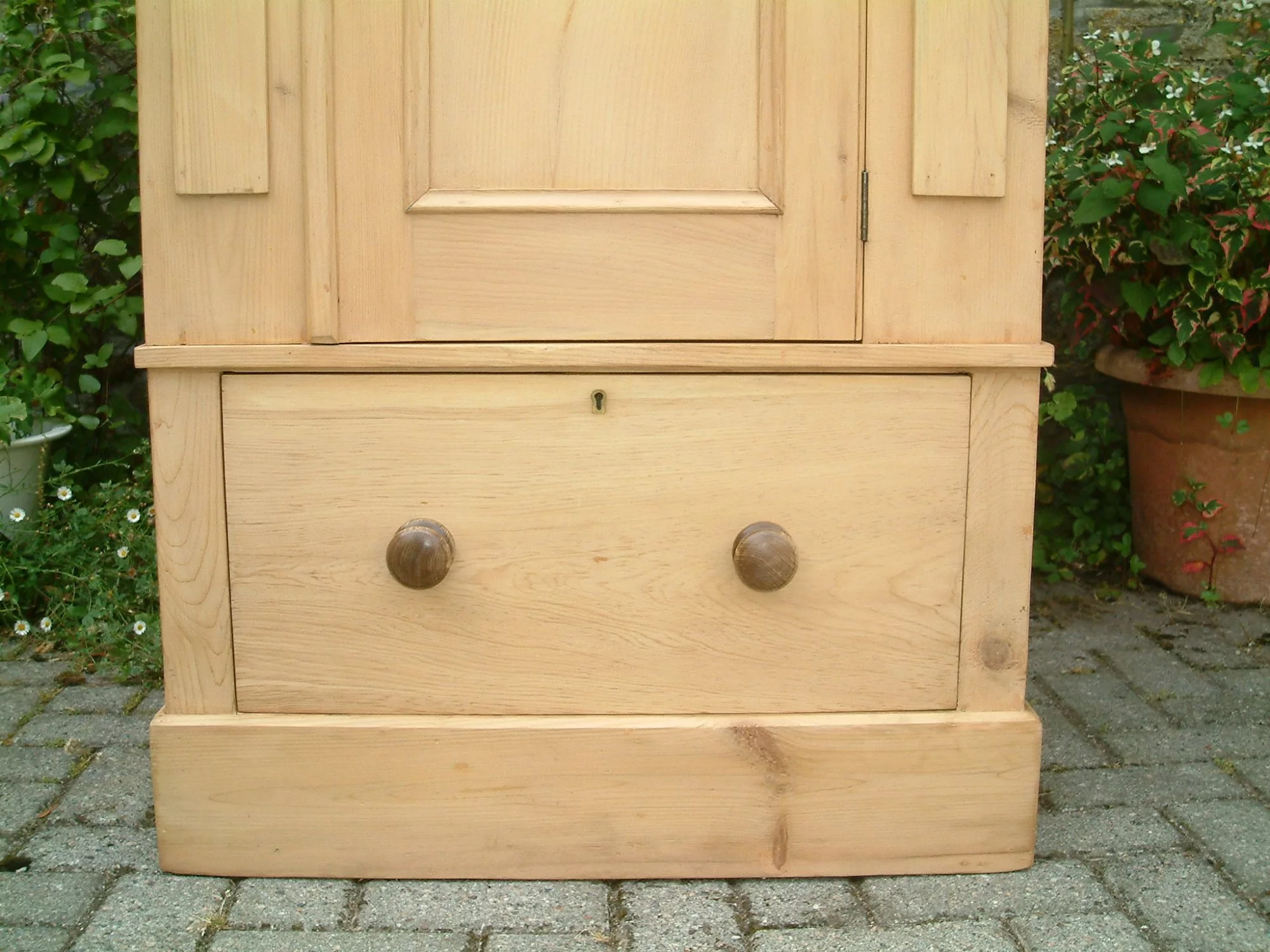 Victorian pine wardrobe - base drawer